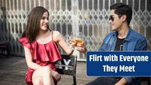 Young couple sitting in a drinking glass.