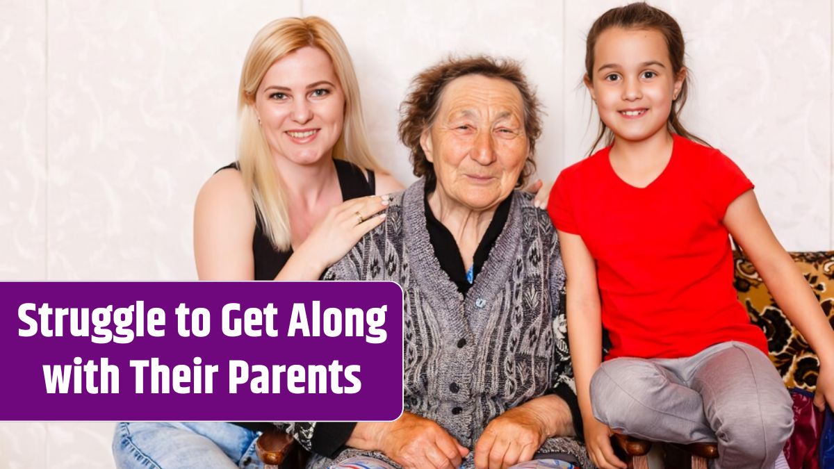 Senior woman hugging granddaughter while sitting on sofa at home.