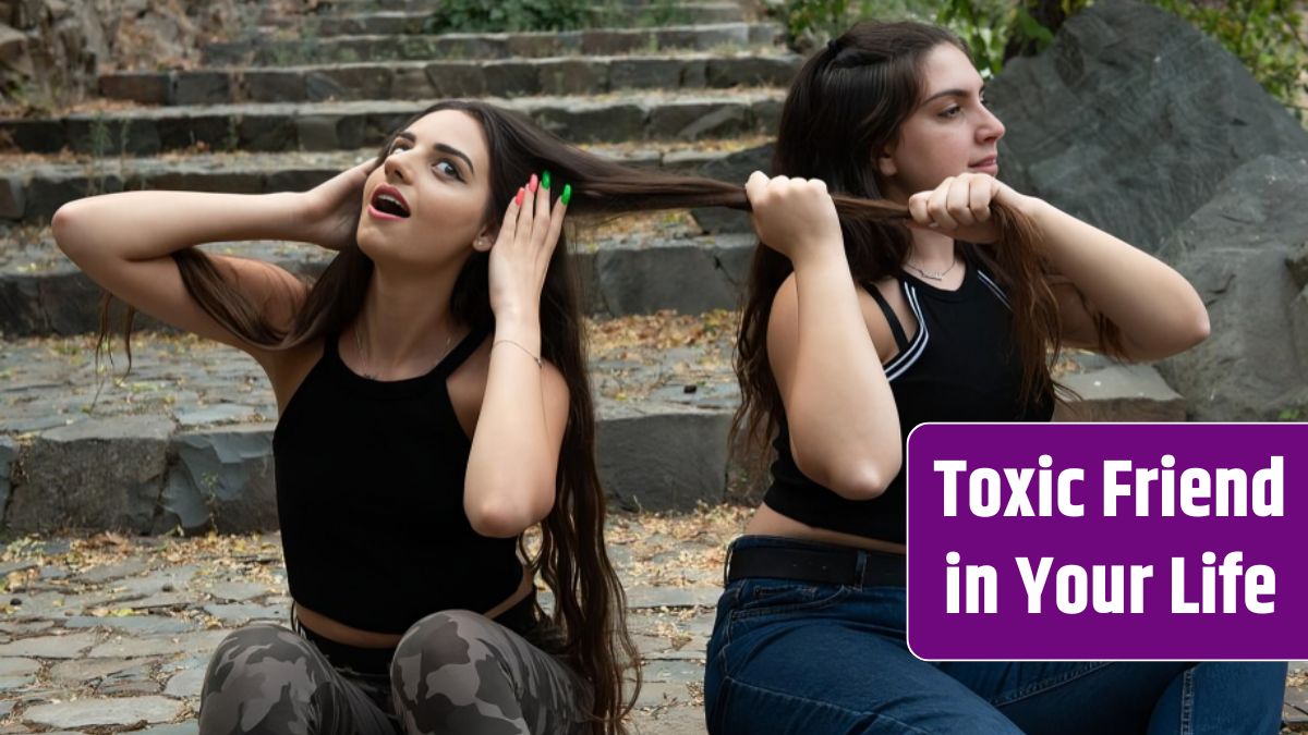 Two women fighting and pulling each others hair while sitting on a stoned ladder.