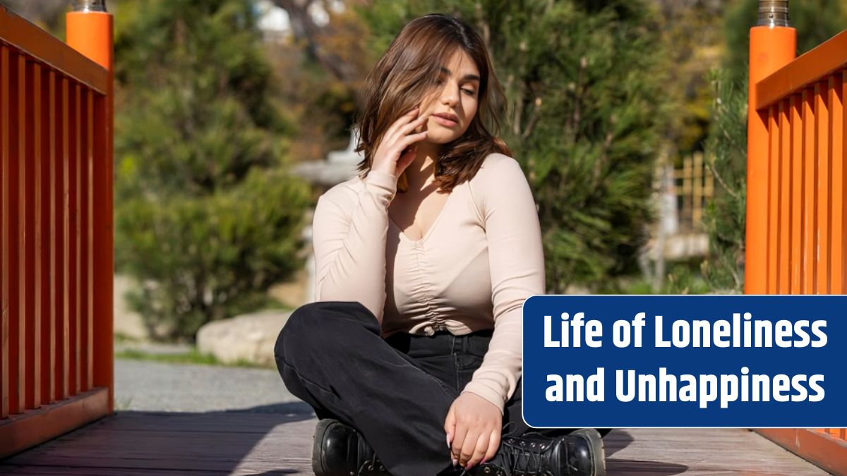 A beautiful young girl cross her legs and sitting on the ground.